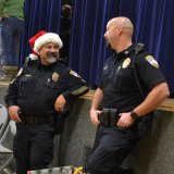 Lemoore police officers taking a break during Friday's "Reason for the Season."